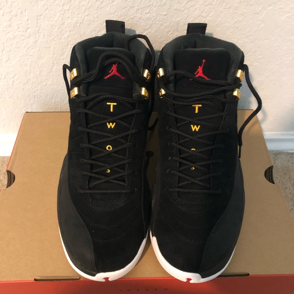 Black and white Jordan 12s Taxi